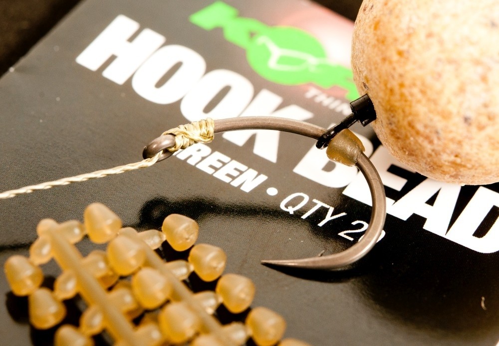 Opritoare de cârlig Korda Hook Bead, Large, 20buc/plic