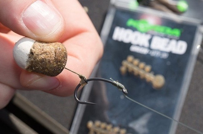 Opritoare de cârlig Korda Hook Bead, Large, 20buc/plic